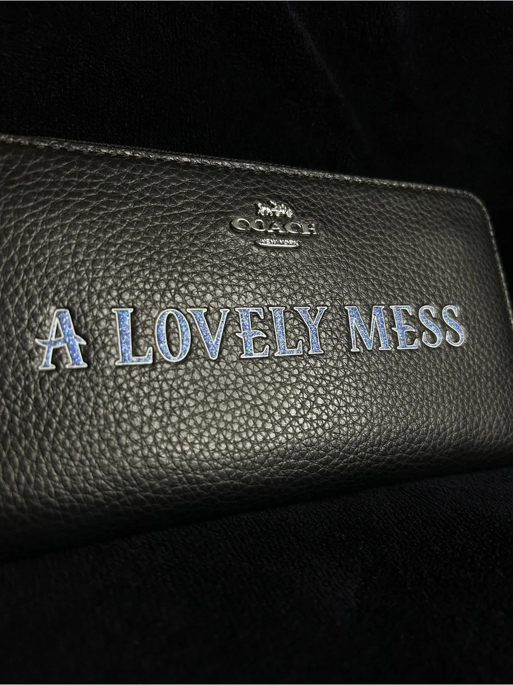 Coach x Disney The Little Mermaid Wristlet with Blue Text 